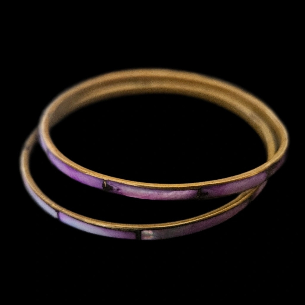 Set of two. Beautiful shades of Purple dyed shells inlaid into brass bangles.